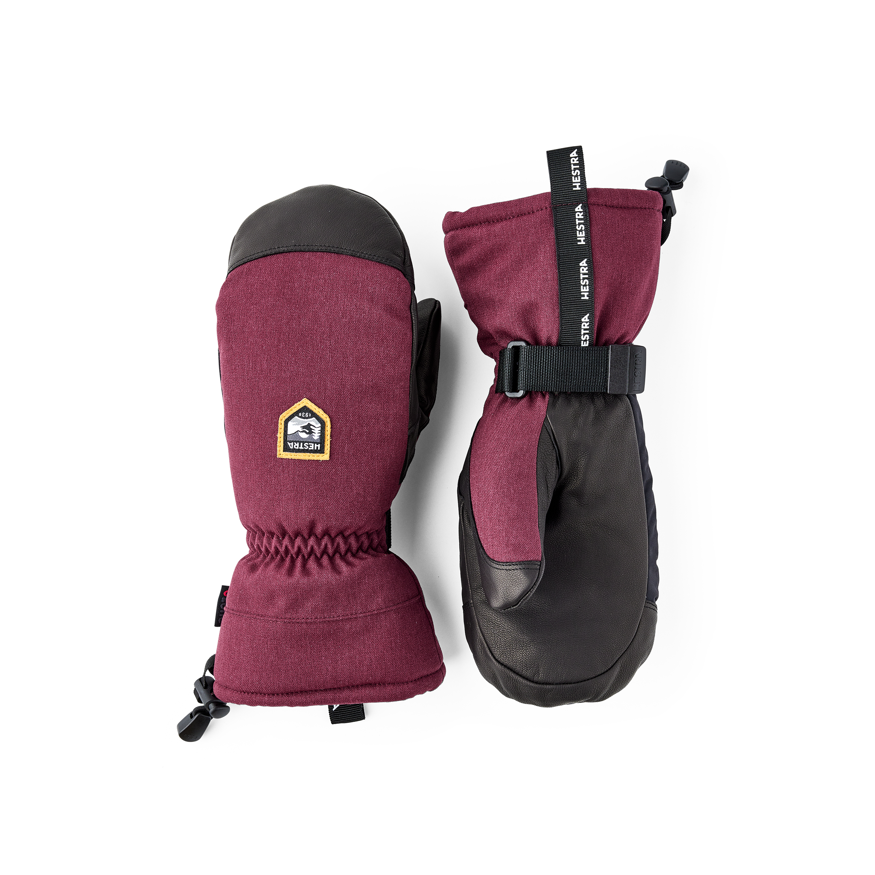 Vinröd tumhandske med svart getskinn i innerhanden och handledsjustering