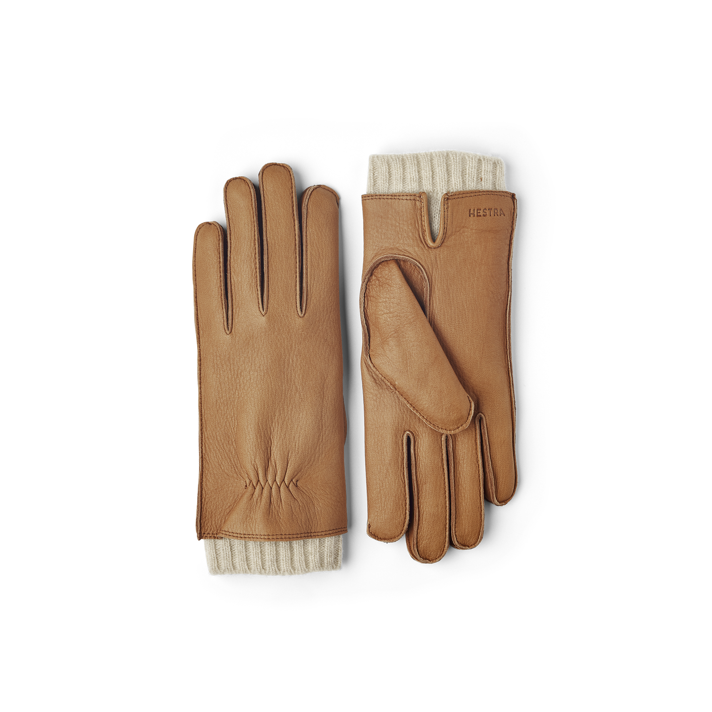 Ljusbrun maskinsydd skinnhandske i hjortskinn med ljusbeige utstickande ullfoder