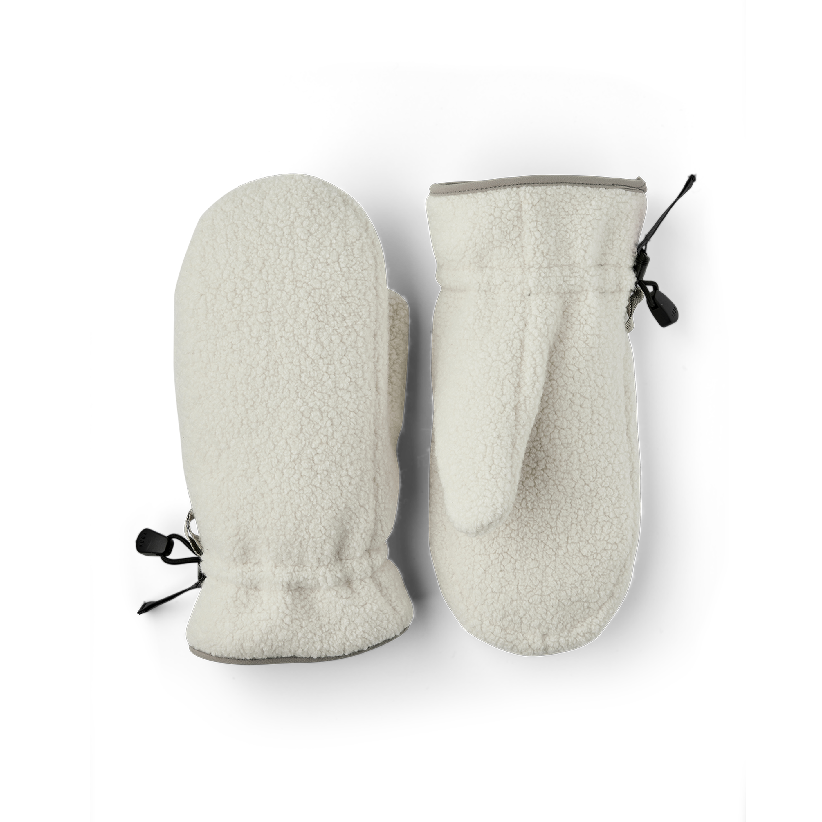 Vit maskinsydd tumhandske i lurvig teddyfleece