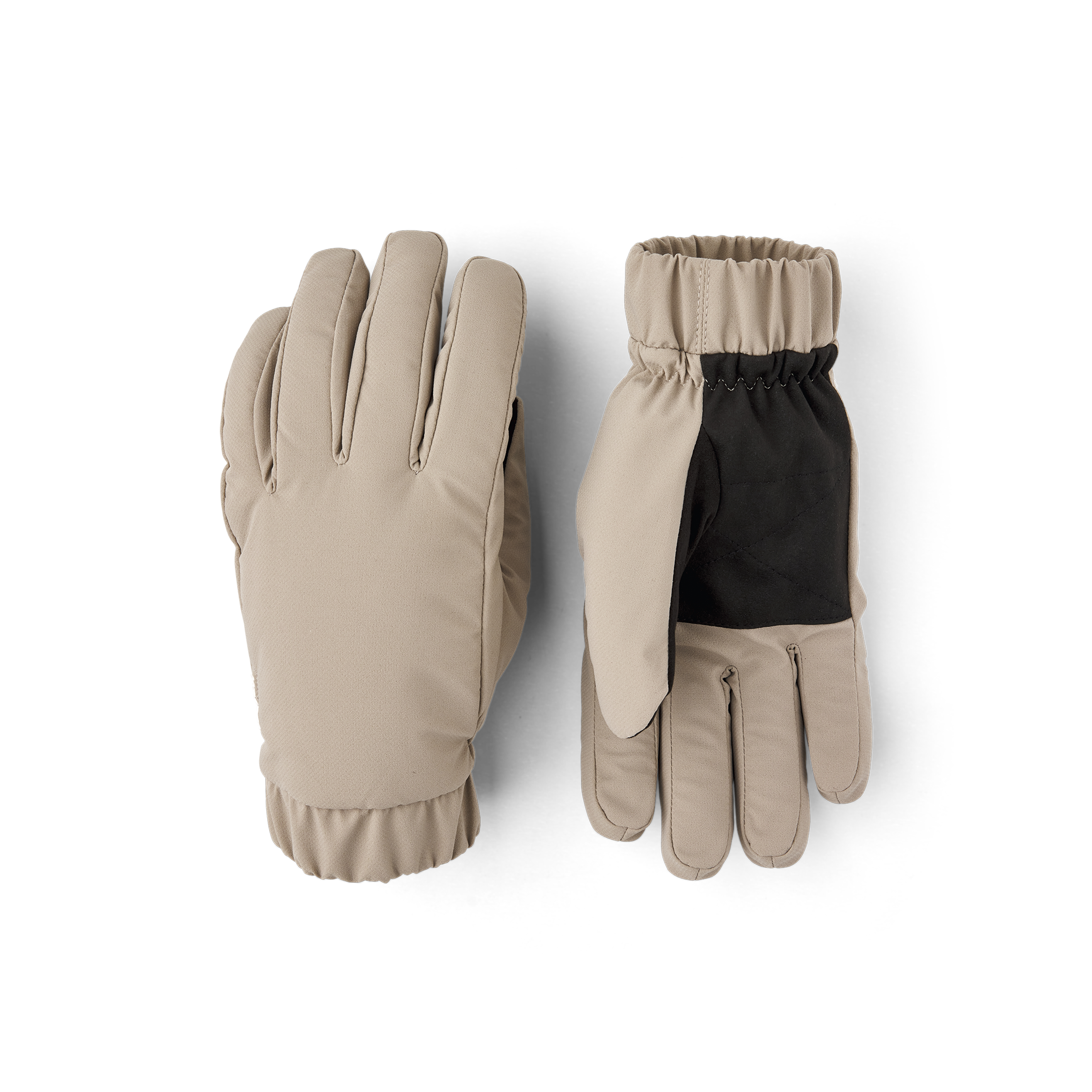 Beige handske i tyg med elastisk mudd i tyg och svart innerhand