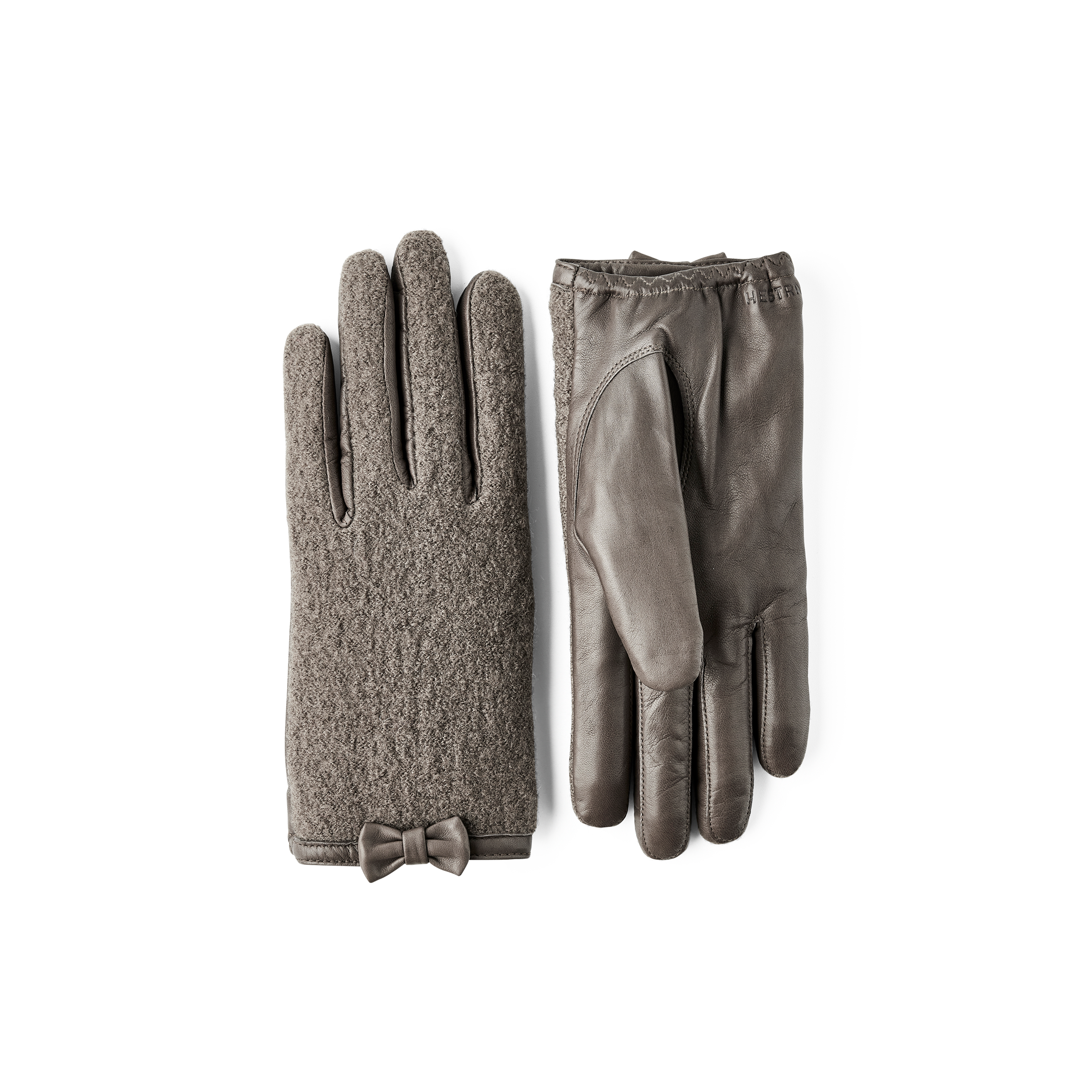 Grön skinnhandske i lammnappa med bouclé-stickad bakhand och liten rosett