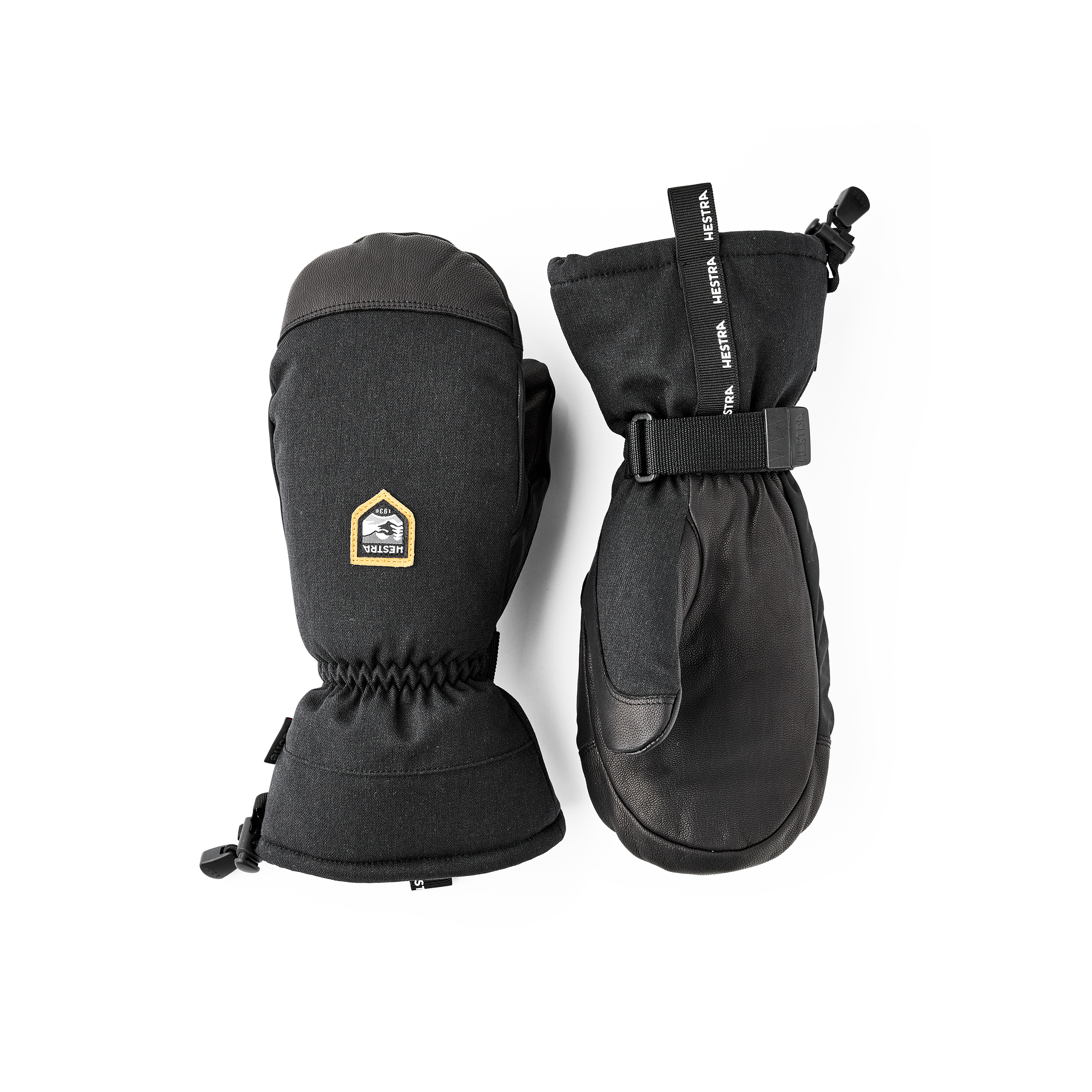 Svart tumhandske med getskinn i innerhanden och handledsjustering