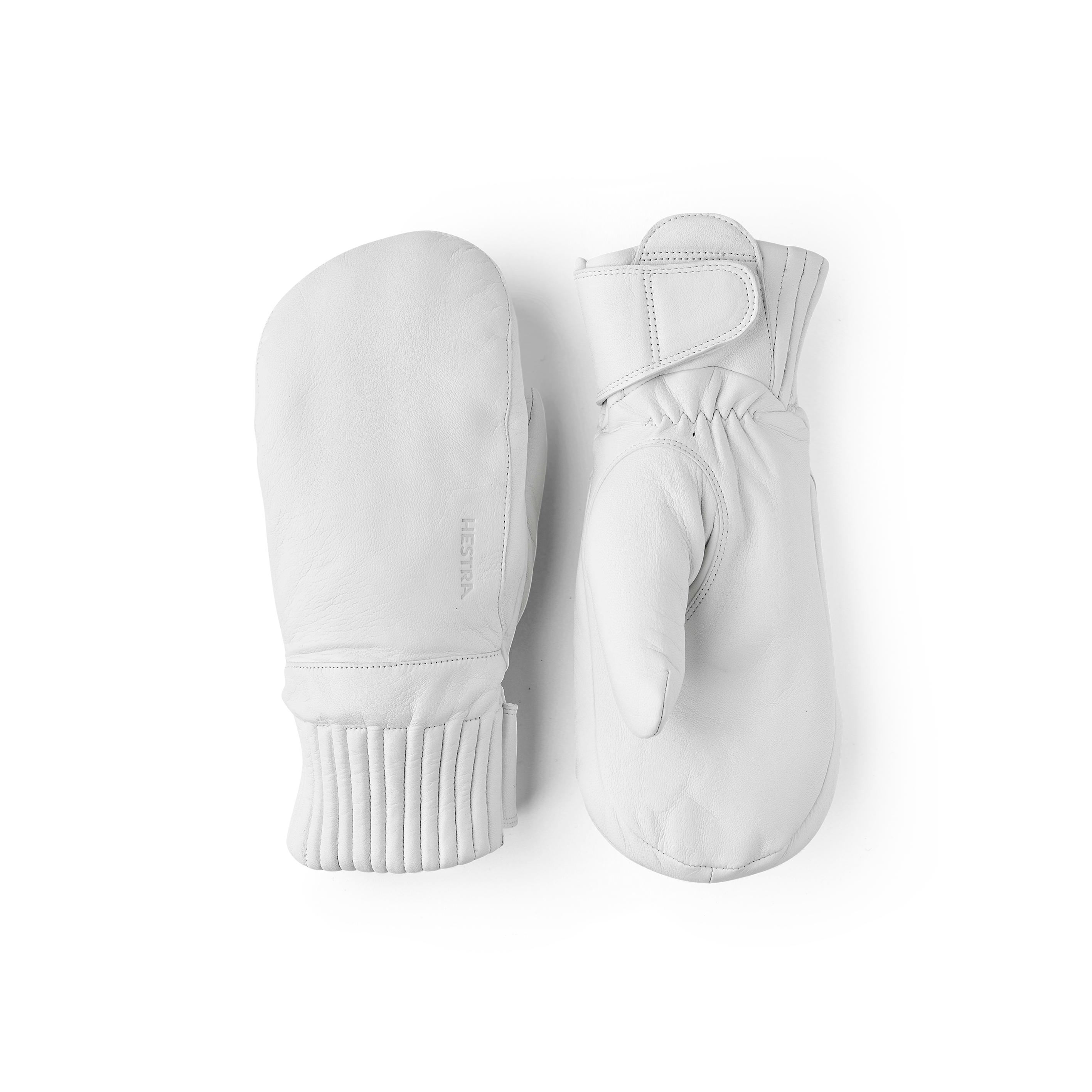 Vit tumhandske i lammnappa