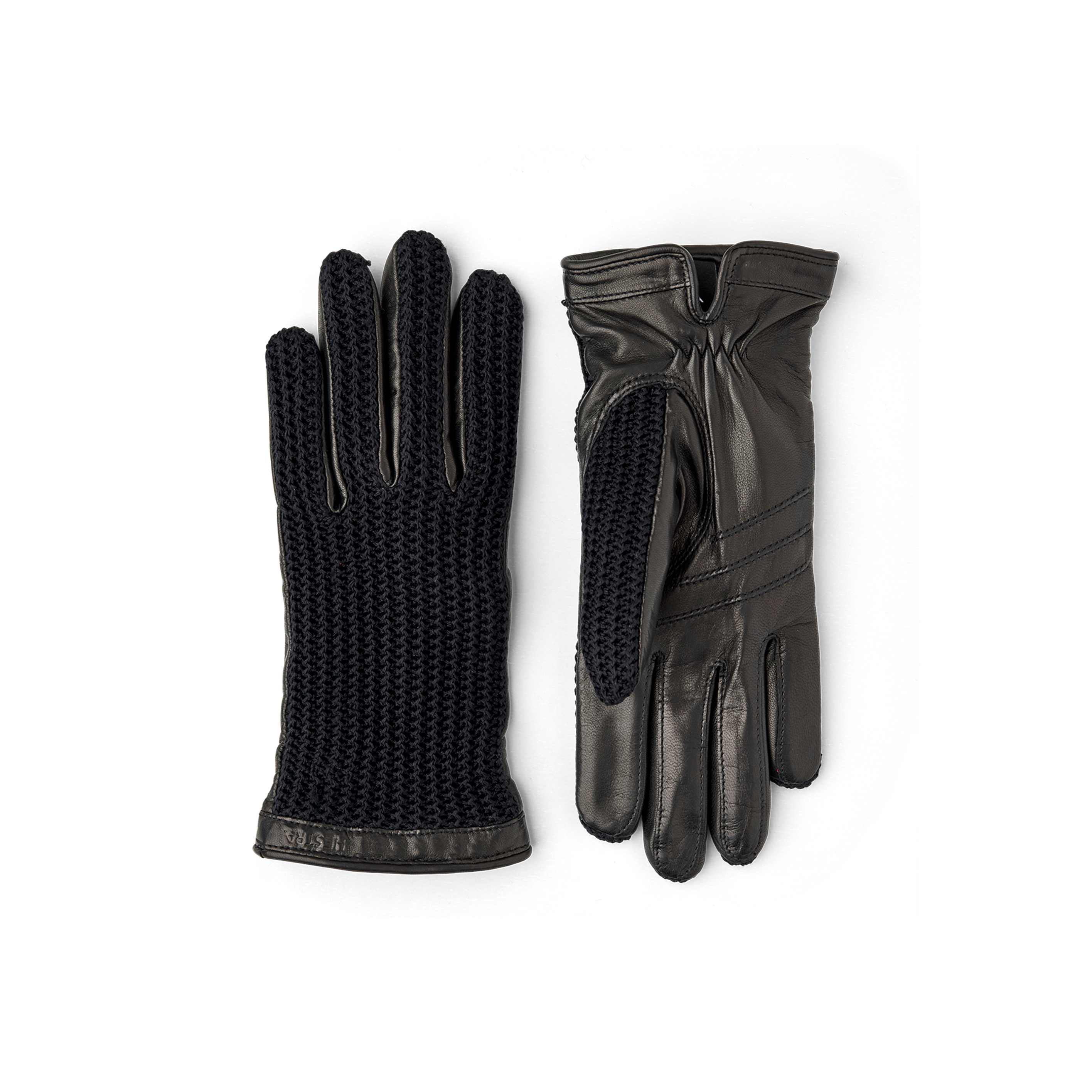 Svarta maskinsydd skinnhandske med virkad bakhand i bomull