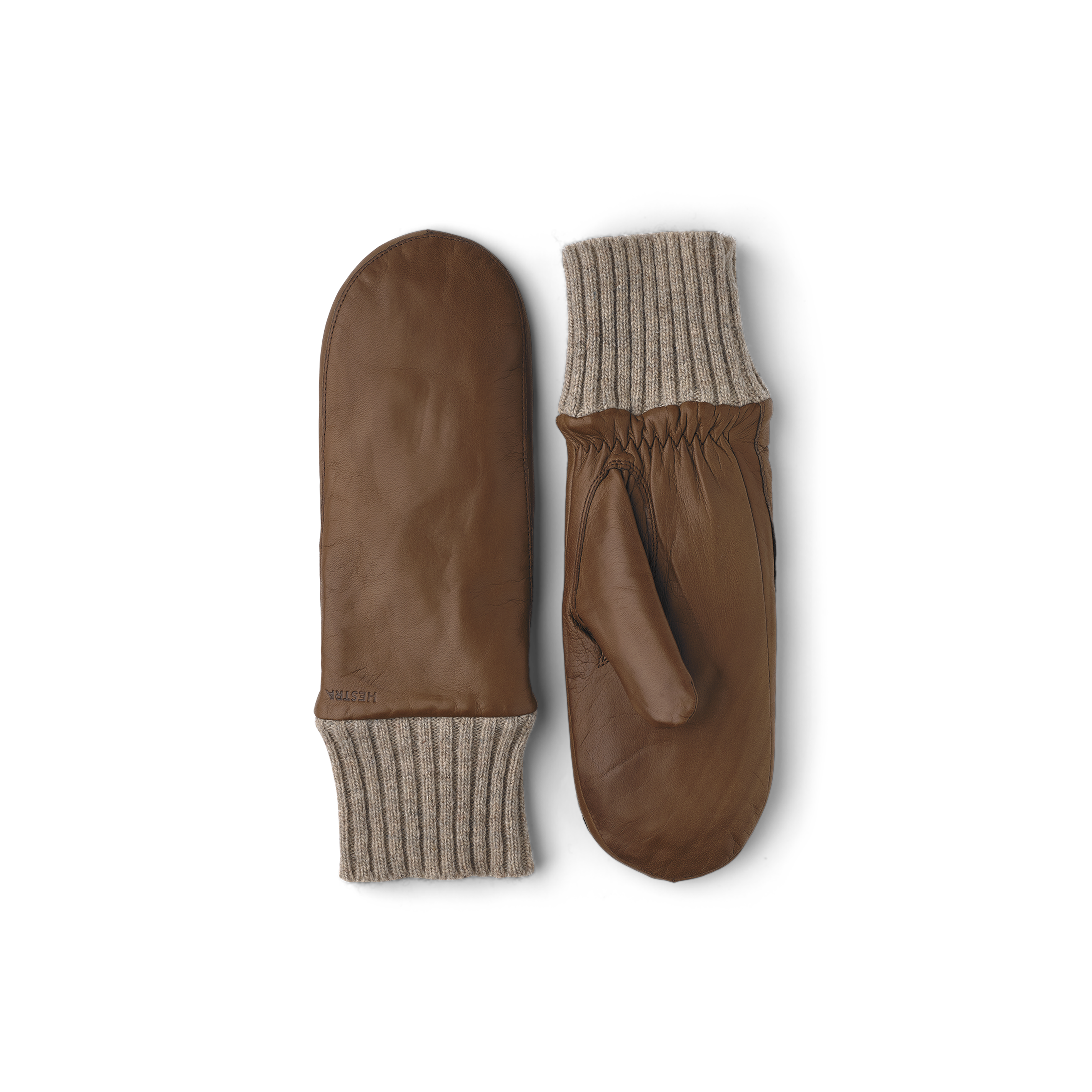 Ljusbrun maskinsydd tumhandske i lammnappa med beige stickad mudd