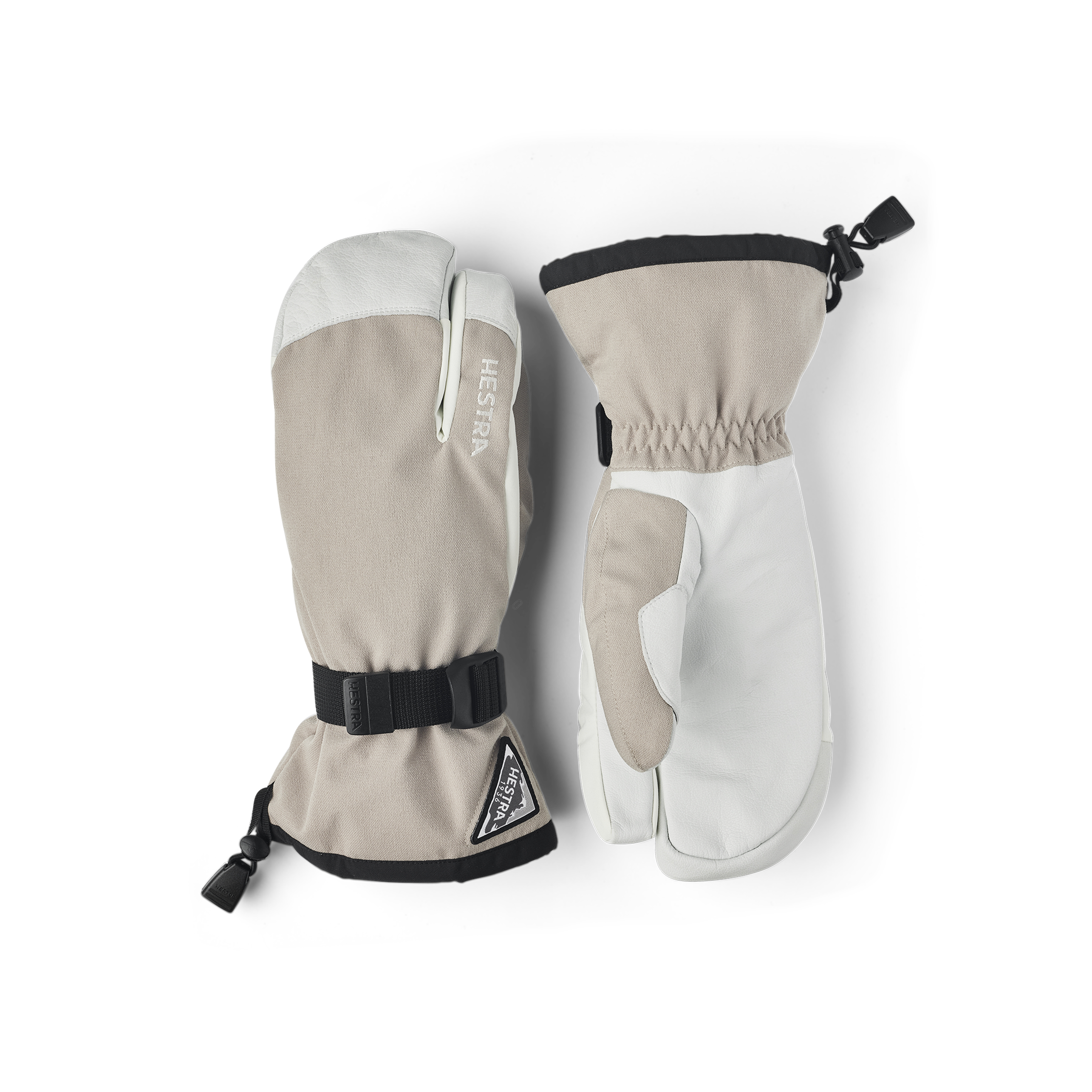 Beige trefingershandke med vitt getskinn i innerhanden och handledsjustering